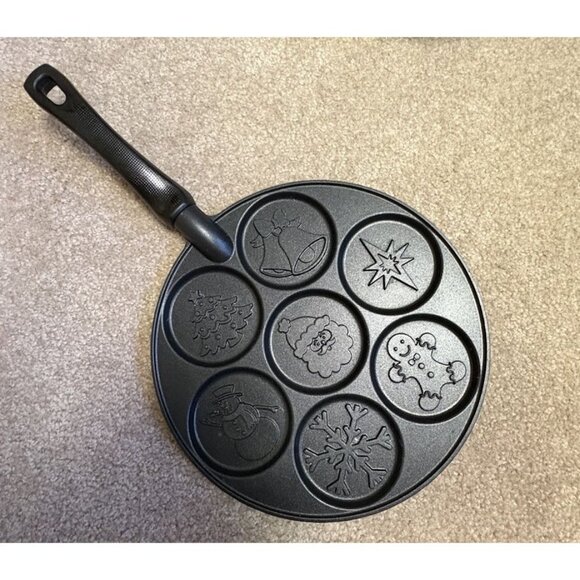 Nordic Ware Holiday Pancake Pan 10" Non-Stick Cast Aluminum Griddle w/ 7 Designs - Picture 1 of 4